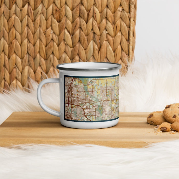 Left View Custom Wylie Texas Map Enamel Mug in Woodblock on Table Top