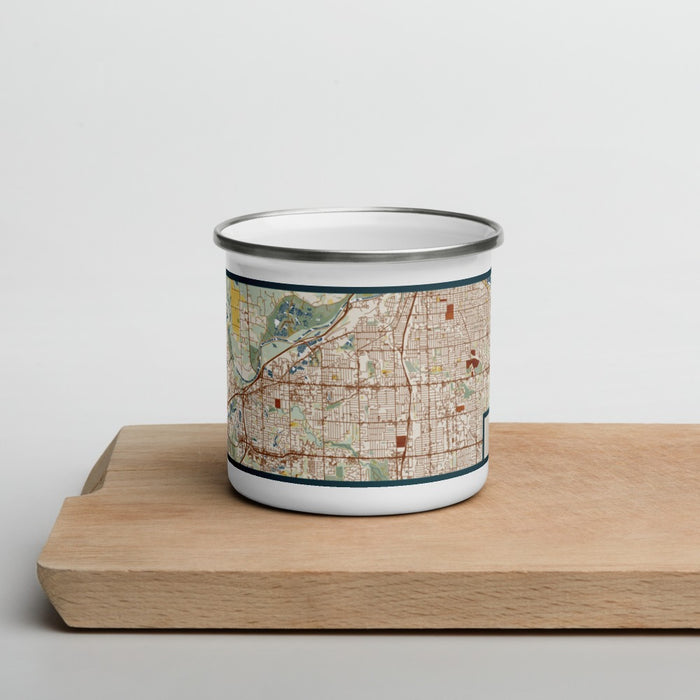 Front View Custom Wyoming Michigan Map Enamel Mug in Woodblock on Cutting Board