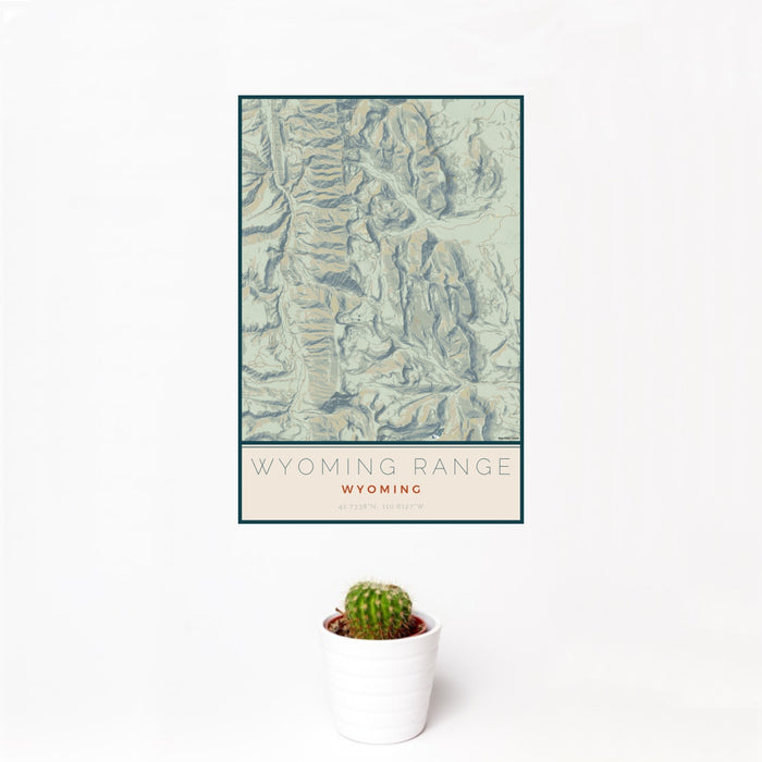 12x18 Wyoming Range Wyoming Map Print Portrait Orientation in Woodblock Style With Small Cactus Plant in White Planter