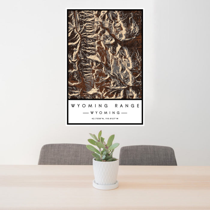 24x36 Wyoming Range Wyoming Map Print Portrait Orientation in Ember Style Behind 2 Chairs Table and Potted Plant