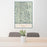 24x36 Wyoming Range Wyoming Map Print Portrait Orientation in Woodblock Style Behind 2 Chairs Table and Potted Plant