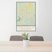 24x36 Yanceyville North Carolina Map Print Portrait Orientation in Woodblock Style Behind 2 Chairs Table and Potted Plant