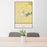 24x36 Yellow Springs Ohio Map Print Portrait Orientation in Woodblock Style Behind 2 Chairs Table and Potted Plant