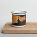 Front View Custom Yellowstone National Park Map Enamel Mug in Ember on Cutting Board