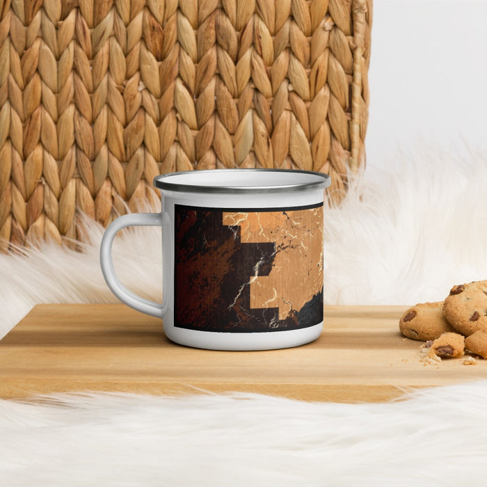 Left View Custom Yellowstone National Park Map Enamel Mug in Ember on Table Top