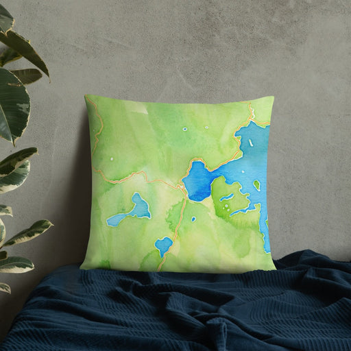 Custom Yellowstone National Park Map Throw Pillow in Watercolor on Bedding Against Wall