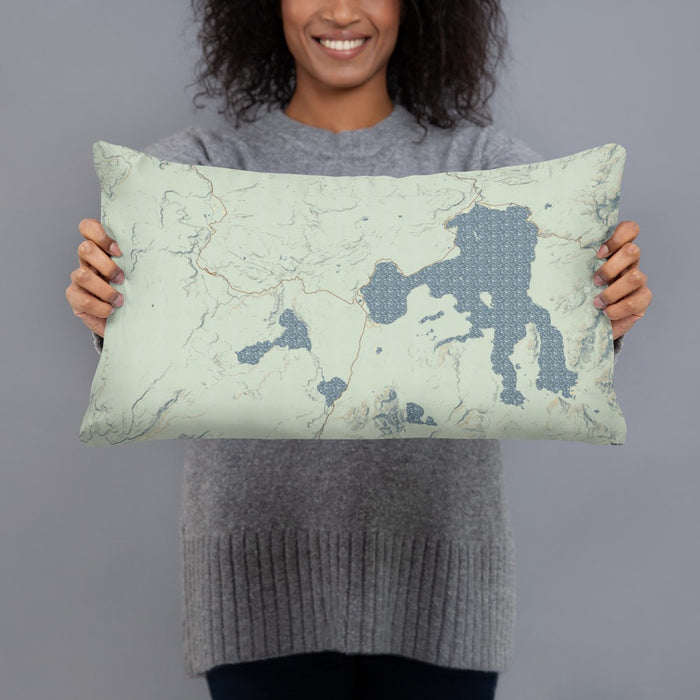 Person holding 20x12 Custom Yellowstone National Park Map Throw Pillow in Woodblock