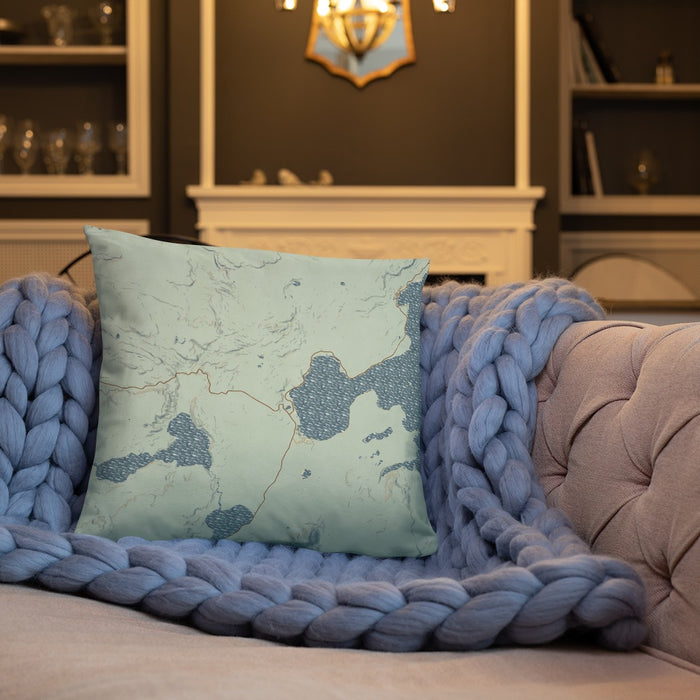 Custom Yellowstone National Park Map Throw Pillow in Woodblock on Cream Colored Couch