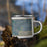 Right View Custom Yelm Washington Map Enamel Mug in Afternoon on Grass With Trees in Background