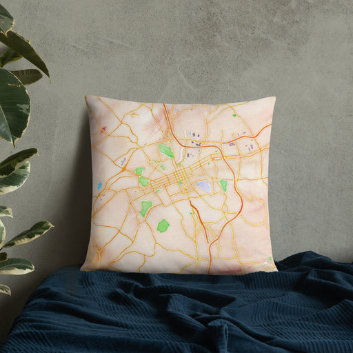 Custom York Pennsylvania Map Throw Pillow in Watercolor on Bedding Against Wall