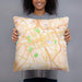 Person holding 18x18 Custom York Pennsylvania Map Throw Pillow in Watercolor