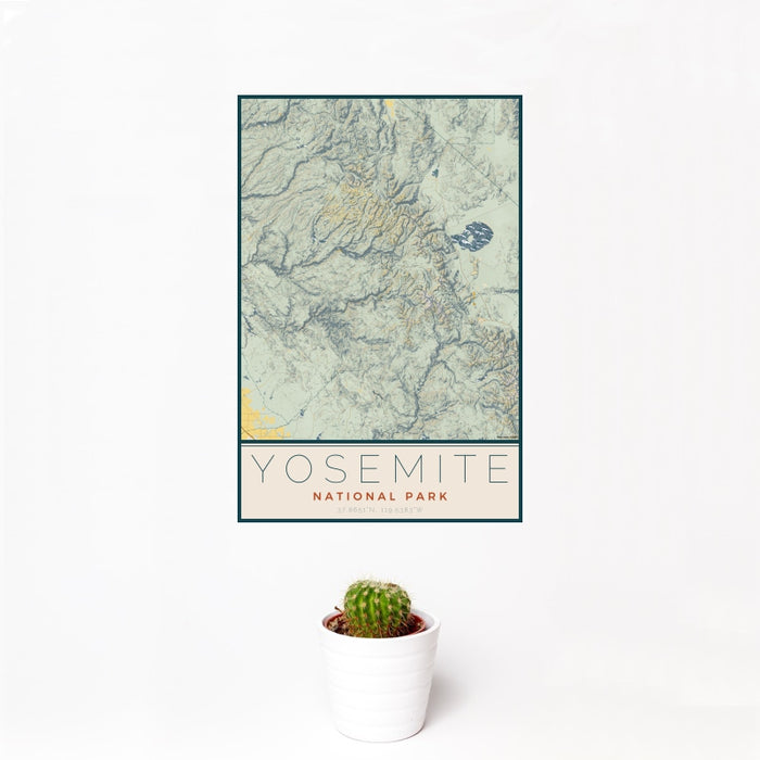 12x18 Yosemite National Park Map Print Portrait Orientation in Woodblock Style With Small Cactus Plant in White Planter
