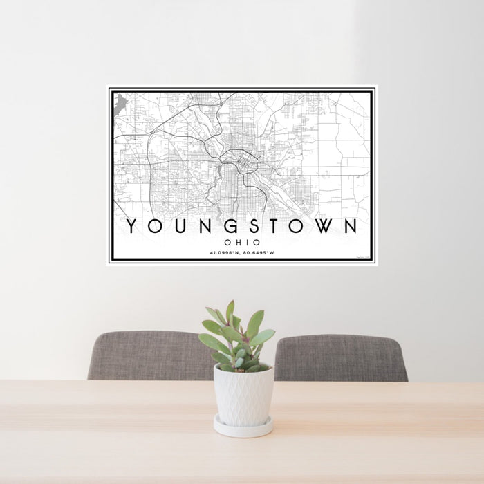 24x36 Youngstown Ohio Map Print Landscape Orientation in Classic Style Behind 2 Chairs Table and Potted Plant