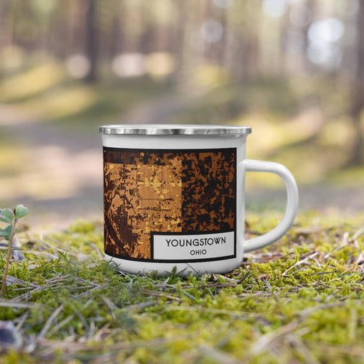 Right View Custom Youngstown Ohio Map Enamel Mug in Ember on Grass With Trees in Background