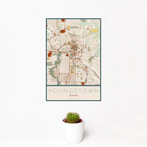 12x18 Youngstown Ohio Map Print Portrait Orientation in Woodblock Style With Small Cactus Plant in White Planter
