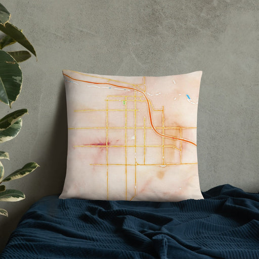 Custom Yuma Arizona Map Throw Pillow in Watercolor on Bedding Against Wall
