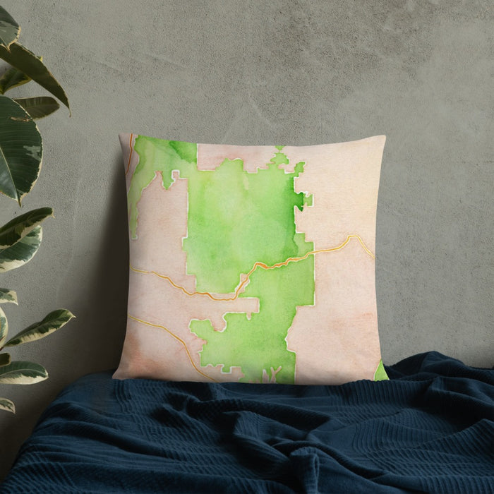 Custom Zion National Park Map Throw Pillow in Watercolor on Bedding Against Wall