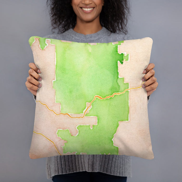Person holding 18x18 Custom Zion National Park Map Throw Pillow in Watercolor