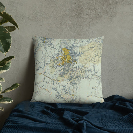 Custom Zion National Park Map Throw Pillow in Woodblock on Bedding Against Wall
