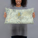 Person holding 20x12 Custom Zion National Park Map Throw Pillow in Woodblock