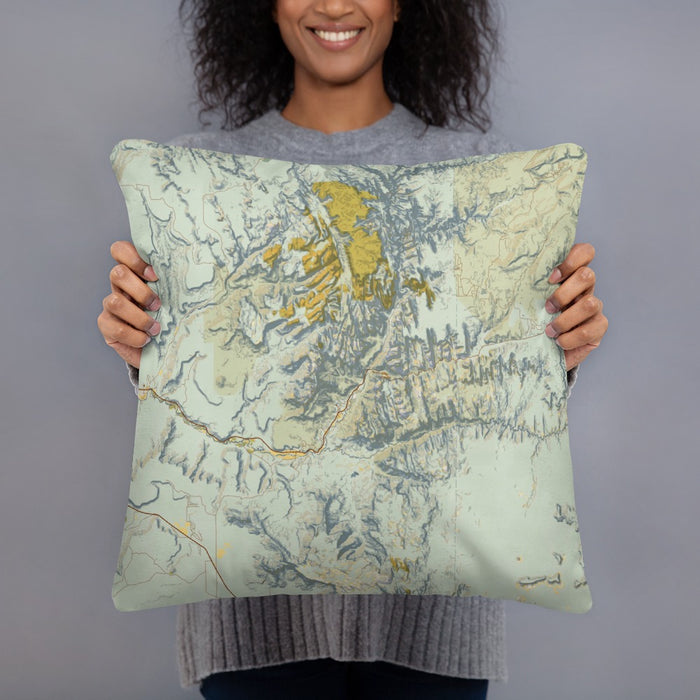 Person holding 18x18 Custom Zion National Park Map Throw Pillow in Woodblock